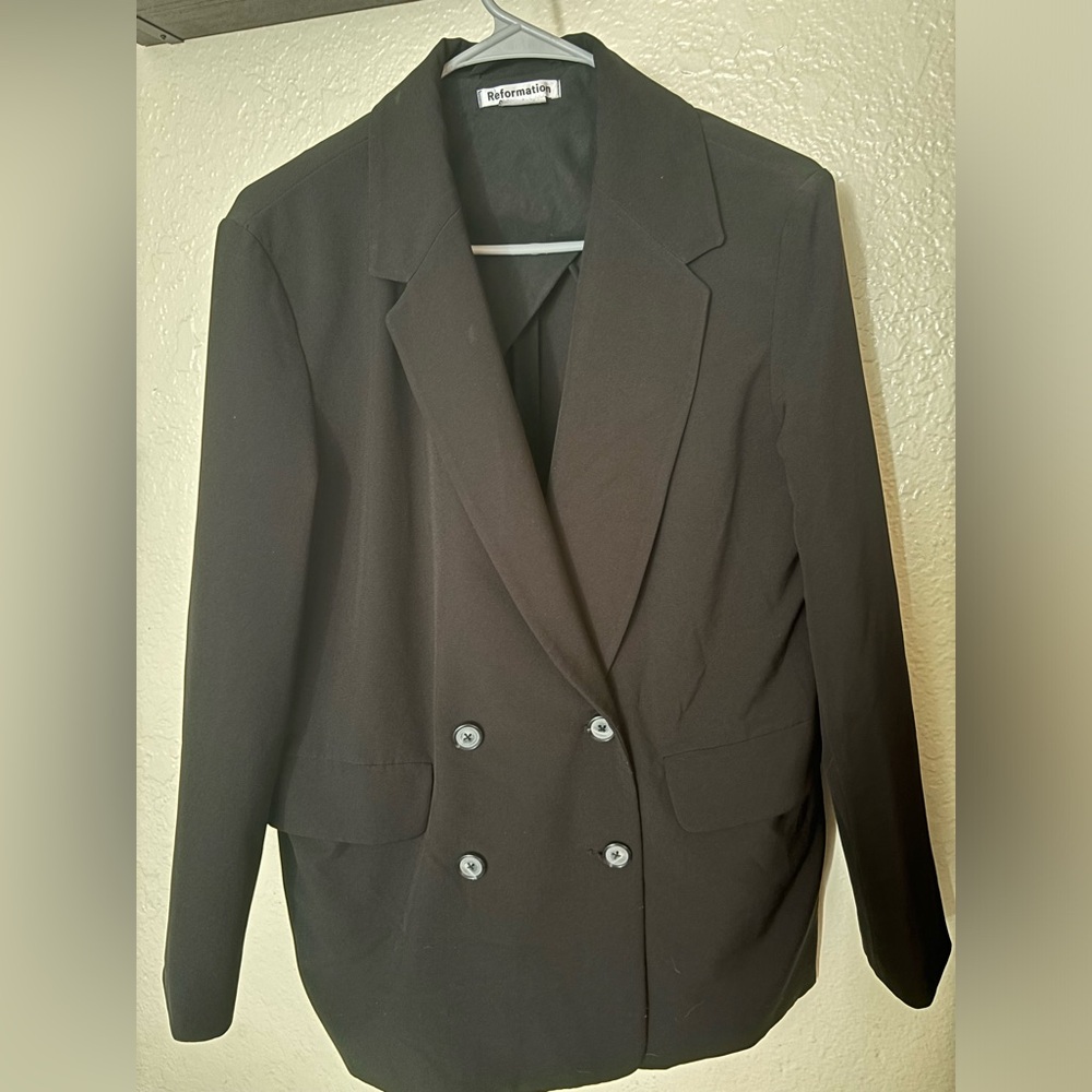 Reformation black blazer in size M